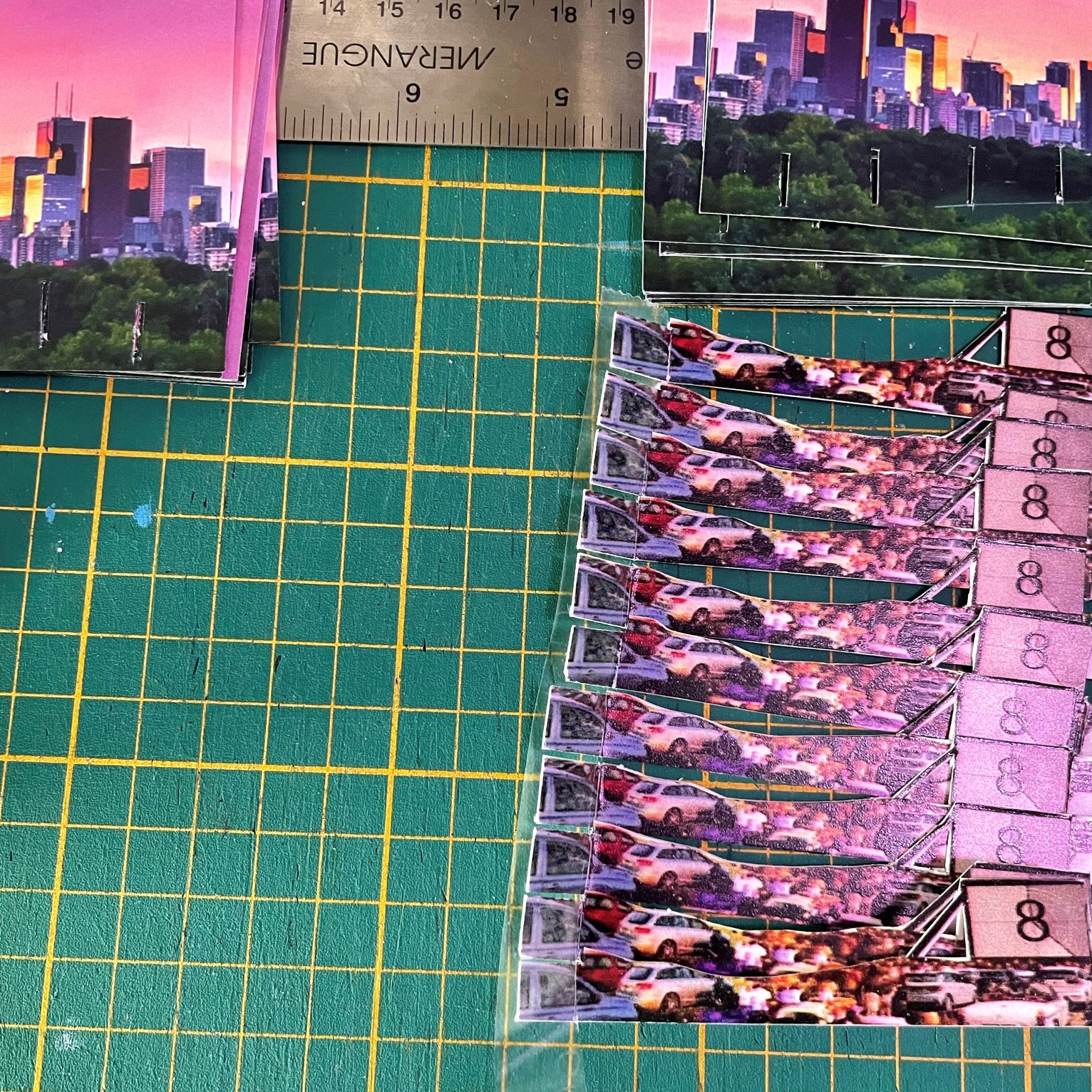 After the misfortune of our initial vendor for the trial event, I got to learn how to find efficiencies in hand-cutting the 10+ pieces over 30 times. UV graphics are welcoming in not stripping when using tape to stabilize many pieces. I now have access to weights would make this much easier.